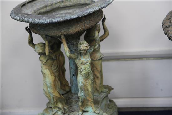 A pair of lead garden urns, W.1ft 6in. H.2ft 5in.